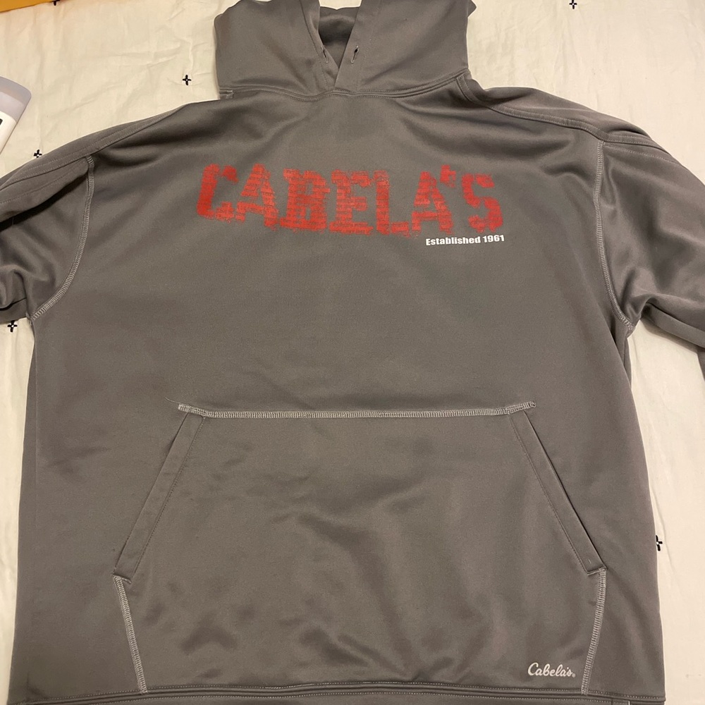Men’s Cabelas Sweatshirt, written in red lettering.